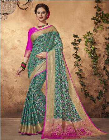 Grab This Pretty Saree For Your Festive Or Semi-Casual Wear In Green Color Paired With Contrasting Pink Colored Blouse. This Saree And Blouse Are Fabricated On Art Silk Beaurified With Weave. It Is Light Weight And Easy To Carry All Day Long.