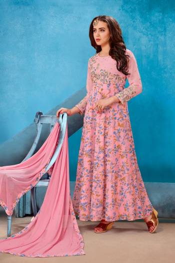 Look Pretty Wearing This Designer Semi-Stitched Suit In Light Pink Colored Top Paired With Light Pink Colored Bottom And Dupatta. Its Top Is Fabricated On Georgette Paired With Santoon Bottom And Chiffon Dupatta. It Is Beautified With Contrasting Colored Prints And Embroidery. Buy Now.