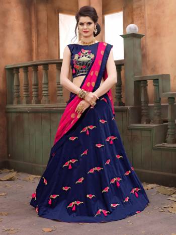 Enhance Your Personality Wearing this Designer Lehenga Choli In Navy Blue Color Paired With Contrasting Rani Pink Colored Dupatta. Its Blouse And Lehenga Are Fabricated On Soft Silk Paired With Chiffon Dupatta. It Is Light Weight And Ensures Superb Comfort All Day Long.