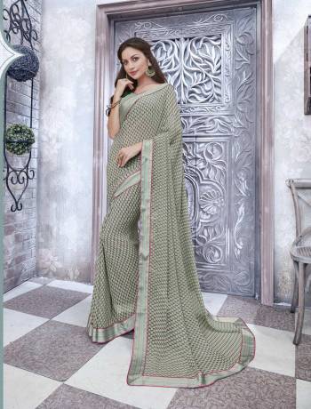 Summers Is About Subtle Shades And Pastel Play, So Grab This Saree In Pastel Green Color Paired With Pastel Green Colored Blouse. This Saree And Blouse Are Fabricated On Georgette Beautified With Intricate Prints. 