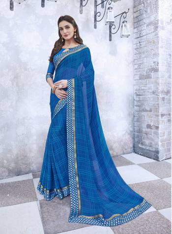 Grab This Pretty Simple Saree In Blue Color Paired With Blue Colored Blouse. This Saree And Blouse Are Fabricated On Georgette Beautified With Checks Prints All Over The Saree. Buy This Simple Saree For Your Casual Wear Now.