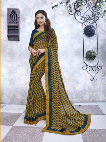 Bright Combination Is Here With This Yellow And Blue Colored Saree Paired With  Blue Colored Blouse. This Saree And Blouse Are Fabricated On Georgette Beautified With Bold Prints. Get This Pretty Light Weight Saree Now.