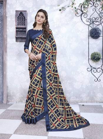 You Will Definitely Earn Lots Of Compliments Wearing This Saree In Cream And Blue Color Paired With Blue Colored Blouse. This Saree And Blouse Are Fabricated On Georgette Beautified With Checks Prints All Over It. Buy Now.