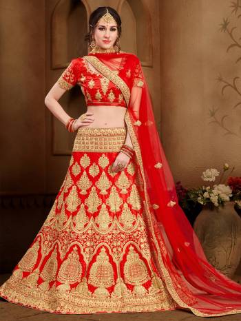 Grab This Beautiful Heavy Designer Lehenga For The Upcoming Wedding Season. This Bright And Appealing Red Colored Lehenga Choli Paired With Red Colored Dupatta Will Make You Earn Lots Of Compliments From Onlookers. Its Blouse And Lehenga Are Fabricated On Art Silk Paired With Net Fabricated Dupatta. Its Has Heavy Jari Embroidery All Over It. Buy This Designer Lehenga Choli Now.