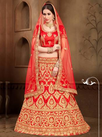 Grab This Beautiful Heavy Designer Lehenga For The Upcoming Wedding Season. This Bright And Appealing Red Colored Lehenga Choli Paired With Red Colored Dupatta Will Make You Earn Lots Of Compliments From Onlookers. Its Blouse And Lehenga Are Fabricated On Art Silk Paired With Net Fabricated Dupatta. Its Has Heavy Jari Embroidery All Over It. Buy This Designer Lehenga Choli Now.