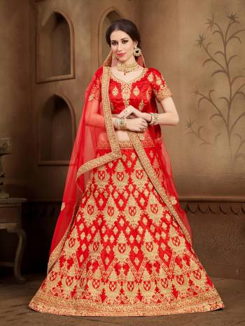 Grab This Beautiful Heavy Designer Lehenga For The Upcoming Wedding Season. This Bright And Appealing Red Colored Lehenga Choli Paired With Red Colored Dupatta Will Make You Earn Lots Of Compliments From Onlookers. Its Blouse And Lehenga Are Fabricated On Art Silk Paired With Net Fabricated Dupatta. Its Has Heavy Jari Embroidery All Over It. Buy This Designer Lehenga Choli Now.