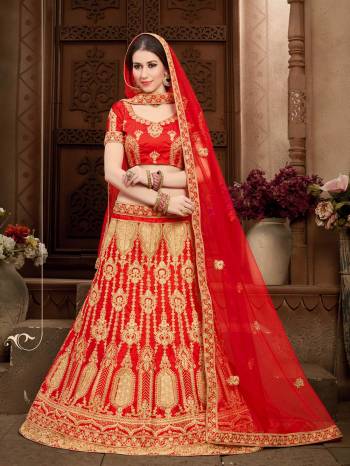 Grab This Beautiful Heavy Designer Lehenga For The Upcoming Wedding Season. This Bright And Appealing Red Colored Lehenga Choli Paired With Red Colored Dupatta Will Make You Earn Lots Of Compliments From Onlookers. Its Blouse And Lehenga Are Fabricated On Art Silk Paired With Net Fabricated Dupatta. Its Has Heavy Jari Embroidery All Over It. Buy This Designer Lehenga Choli Now.