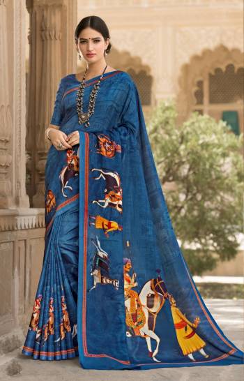 Grab This Pretty Blue Colored Saree Paired With Blue Colored Blouse. This Saree And Blouse Are Fabricated On Tussar Art Silk Beautified With Prints All Over. This Saree Is Light Weight And Easy To Carry All Day Long. Grab This Saree Now.