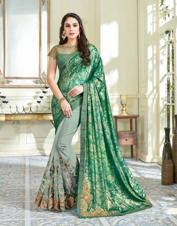 Look fabulous in this lively green saree adorned with floral embroidery details. Add stylish golden jhumkis to uplift the look. 