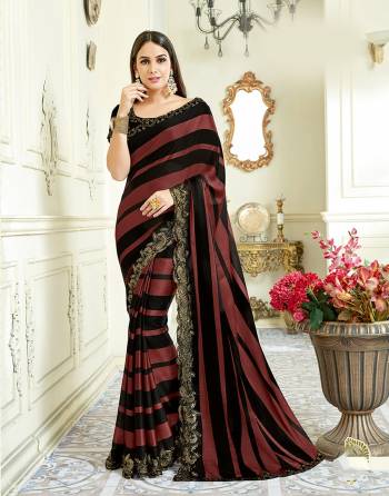 Classic and stylish, this striped saree with subtle detailing is for all those who love minimal yet appealing ethnic wear. Choose statement danglers and sleek makeup for a look that?s chic. 