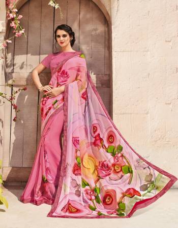 Look Pretty Wearing this Saree In Pink Color Paired With Pink Colored Blouse. This Saree Is Fabricated On Chiffon Crepe Paired With Art Silk Fabricated Blouse. It Has Bold Floral Prints All Over It. Buy This Saree Now.