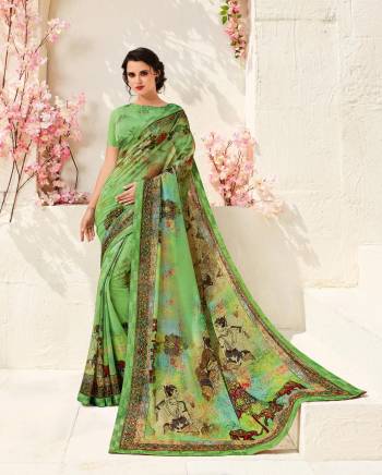 Add This Lovely Saree To Your Wardrobe For Your Semi Or Festive Wear. This Pretty Saree Is In Green Color Paired With Green Colored Blouse. This Saree Is Fabricated On Chiffon Crepe Paired With Art Silk Fabricated Blouse. It Is Light Weight, Durable And Easy To Carry All Day Long.