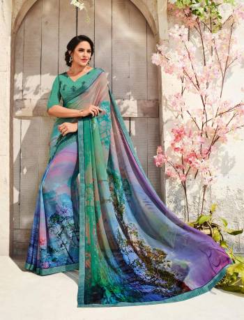 Go Colorful Wearing This Saree In Multi Color Paired With Sea Green Colored Blouse. This Saree Is Fabricated On Chiffon Crepe Paired With Art Silk Fabricated Blouse. It Is Beautified With Prints All Over. This Elegant Looking Saree Will Earn You Lots Of Compliments From Onlookers. Buy Now.