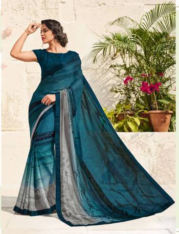 You Will Definitely Earn Lots Of Compliments Wearing This Saree In Lovely Shade Of Bluw With This Prussian Blue Colored Saree Paired With Prussian Blue Colored Blouse. This Saree Is Fabricated On Chiffon Crepe Paired With Art Silk Fabricated Blouse. It Is Light Weight, Durable And Easy To Care For.