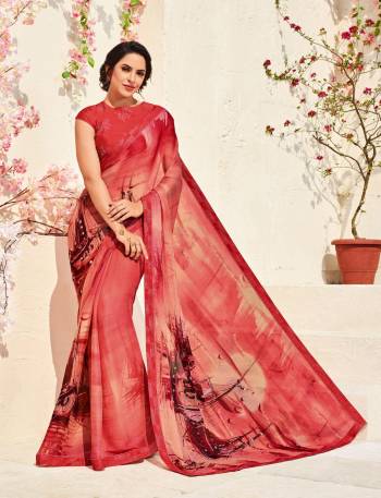 Shine Bright Wearing This Pretty Attractive Saree In Dark Peach Color Paired With Dark Peach Colored Blouse. This Saree Is Fabricated On Chiffon Crepe Paired With Art Silk Fabricated Blouse. It Is Beautified With Prints And Also Light In Weight And Easy To Carry All Day Long.