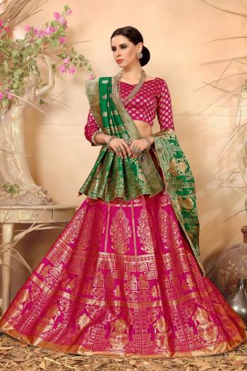 Bright And Visually Appealing Color Is Here With This Magenta Pink Colored Lehenga Choli Paired With Contrasting Green Colored Dupatta.This Whole Lehenga Choli And Dupatta Are Fabricated On Jacquard Silk Beautified With Weave. Buy Now.