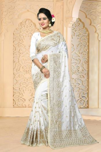 Simple And Elegant Looking Saree Is Here In White Color Paired With White Colored Blouse. This Saree And Blouse Are Fabricated On Art Silk Beautified With Jari Embroidery And Stone Work. This Saree Will Also Earn You Lots Of Compliments From Onlookers.