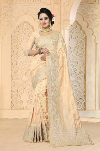 Flaunt Your Rich And Elegant Taste Wearing This Saree In Beige Color Paired With Beige Colored Blouse. This Saree And Blouse Are Fabricated On Art Silk Beautified With Jari Embroidery And Stone Work. Buy This Lovely Saree Now.