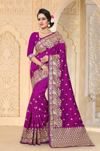 Get Ready For The Upcoming Fetive And Wedding Season wearing This Saree In Purple Color Paired With Purple Colored Blouse. This Saree And Blouse Are Fabricated On Art Silk Beautified with Jari Embroidery And Stone Work Making The Saree More Attractive.