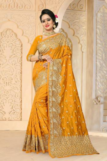 Celebrate This Festive Season Wearing This Saree In Musturd Yellow Color Paired With Musturd Yellow Colored Blouse. This Saree And Blouse Are Fabricated On Art Silk Beautified With Jari Embroidery And Stone Work. It Is Easy To Drape And Carry All Day Long.