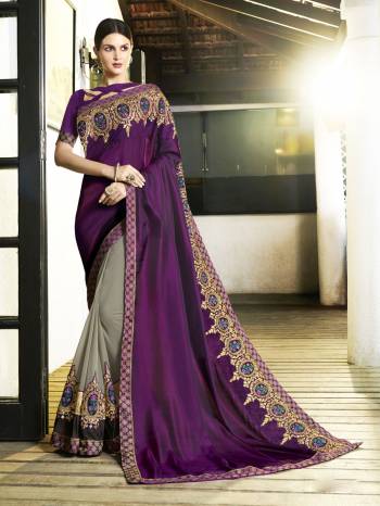 You Will Definitely Earn Lots Of Compliments Wearing This Designer Saree In Purple And Grey Color Paired With Purple Colored Blouse. This Saree Is Fabricated On Satin Silk And Georgette Paired With Art Silk Fabricated Blouse. It Has Heavy Embroidered Border Making The Saree More Attractive.