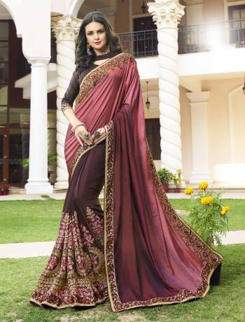 Enhance Your Personality With This Bold Colored Designer Saree In Pink And Dark Wine Shade Paired Wit Dark Wine Colored Blouse. This Saree Is Fabricated On Soft Silk And Georgette Paired with Art Silk Fabricated Blouse. Buy This Designer Saree Now.