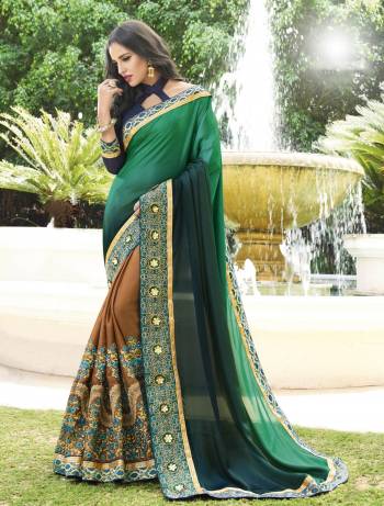 Colors Add Beauty To Any Attire, So Grab This Shaded Saree In Shades OF Bluish Green And Brown Paired With Contrasting Navy Blue Colored Blouse. This Saree Is fabricated On Soft Silk And Georgette Paired With Art Silk Fabricated Blouse. Buy This Designer Saree Now.