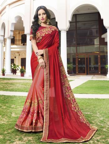 A Must Have Shade In Every Womes Wardrobe Is Here With This Designer Saree In Red And Dark Peach Color Paired With Red Colored Blouse. This Saree Is Fabricated On Silk Georgette And Georgette Paired With Art Silk Fabricated Blouse. Its Fabrics Ensures Superb Comfort And Is Easy To Carry Throughout The Gala.