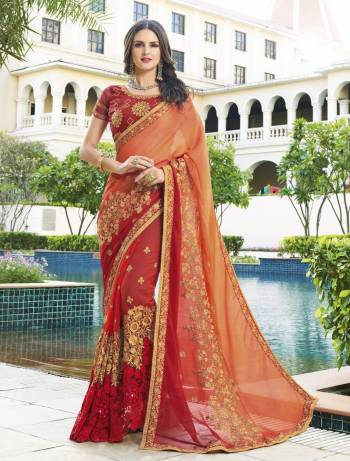 Orange and Red Color Induces Perfect Summer Appeal To Any Outfit, So Grab This Designer Shaded Saree In Orange And Red Color Paired With Red Colored Blouse. This Saree Is Fabricated On Georgette Paired With Art Silk Fabricated Blouse. Buy Now.