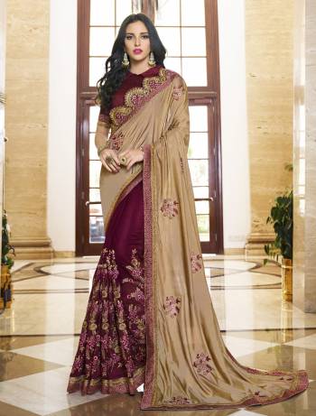 Rich and Elegant Looking Saree Is Here In Beige And Wine Color Paired With Wine Colored Blouse. This Saree Is Fabricated On Soft Silk And Georgette Paired With Art Silk Fabricated Blouse. It Has Heavy Contrasting Colored Embroidery Over The Beautiful Saree. 