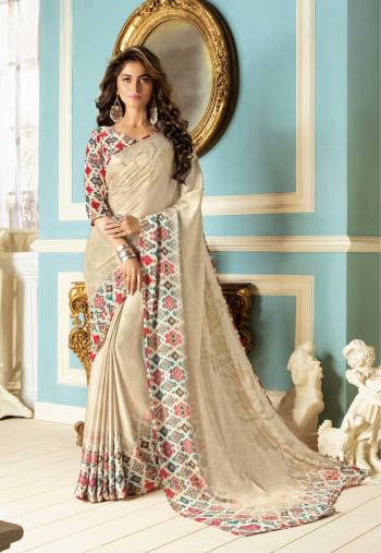 Simple And Elegant Looking Saree Is Here In Cream Color Paired With Multi Colored Blouse. This Saree And Blouse Are Fabricated On Fancy Fabric Beautified With Stone Work. Its Fabrics Ensures Superb Comfort All Day Long. Buy This Saree Now.