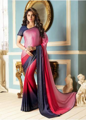 Look Pretty Wearing This Designer Saree In Pink And Navy Blue Color Paired With Navy Blue Colored Blouse. This Saree And Blouse Are Fabricated On Fancy Fabric Beautified With Stone Work. Wear This At The Party, Festive Or Any Social Gatherings. 