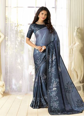 Color That Suits Every Age Group Is Here, Grab This Designer Saree In Grey Color Paired With Dark Grey Colored Blouse. This Saree And Blouse Are Fabricated On Fancy Fabric Beautified With Prints And Stone Work. This Saree Is Light Weight And Easy To Carry All Day Long. Buy It Now.