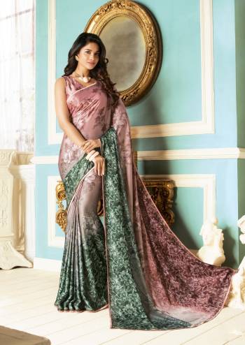 Catch All The Lime Light Wearing This Designer Saree In Dusty Pink And Grey Color Paired With Dusty Pink Colored Blouse. This Saree And Blouse Are Fabricated On Fancy Fabric Beautified With Floral Prints And Stone Work. Buy This Saree Soon Before The Stock Ends.