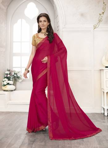 Add This Lovely Designer Saree To Your Wardrobe In Dark Pink Color Paired With Beige Colored Blouse, This Saree Is Fabricated On Chiffon Paired With Art Silk Fabricated Blouse. This Saree Is Light In weight And Its Fabrics Ensures Superb Comfort All Day Long.