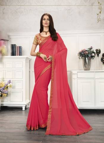 Look Pretty Wearing this Saree In Pink Paired With Beige Colored Blouse. This Saree Is Fabricated On Chiffon Paired With Art Silk Fabricated Blouse. It Is Beautified With Embroidery Which IS Making The Saree More Attractive. Buy Now.