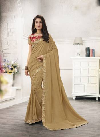 Simple And Elegant Looking Saree Is Here In Beige Color Paired With Beige Colored Blouse, This Saree Is Fabricated On Chiffon Paired With Art Silk Fabricated Blouse. It Is Beautified With Embroidery Over The Blouse And Its Saree Has Lovely Pearl Work All Over It.