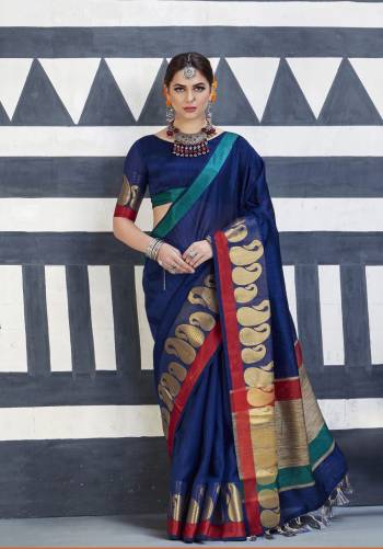 Enhance Your Personality Wearing This Saree In Dark Blue Color Paired With Dark Blue Colored Blouse. This Saree And Blouse Are Fabricated On Nylon Art Silk Which Is Soft Towards Skin, Light Weight And Easy To carry all Day Long.