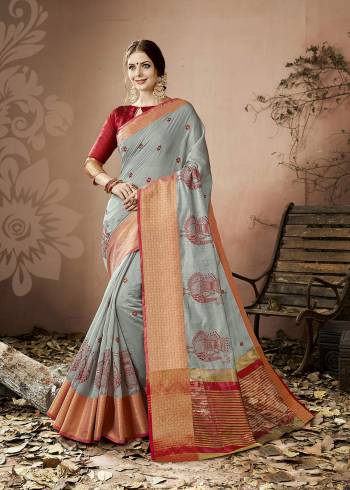 Here Is A Rich And Elegant Looking Saree In Grey Color Paired With Contrasting Maroon Colored Blouse. This Saree And Blouse Are Fabricated On Cotton Silk Beautified With Thread Work And Lace Border. This Saree Is Durable And Easy to Care For.