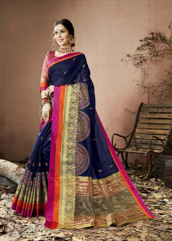 Enhance Your Bold And Beautiful Look Wearing this Pretty Saree In Navy Blue Color Paired With Contrasting Light Pink Colored Blouse. This Saree And Blouse Are Fabricated On Cotton Silk Beautified With Thread Work And Lace Border. Buy This Pretty Saree Now.