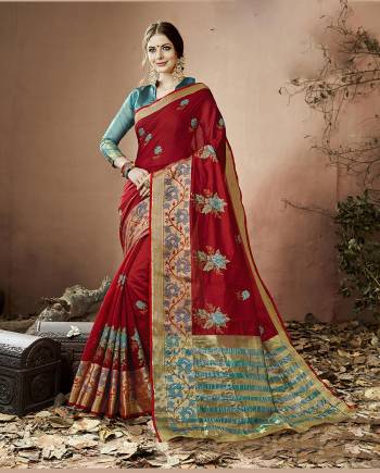 For A Rich Look And Royal Personality, Grab This Pretty Saree In Maroon Color Paired With Contrasting Turquoise Blue Colored Blouse. This Saree And Blouse Are Fabricated On Cotton Silk Beautified With Thread Work. Buy This Saree Now.