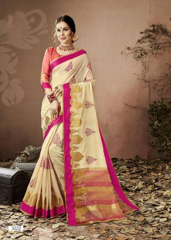 Flaunt Your Rich And Elegant Taste Wearing This Saree In Cream Color Paired With Contrasting Peach Colored Blouse. This Saree And Blouse Are Fabruicated On Cotton Silk Beautified With Thread Work And Lace Border. Buy This Elegant Looking Saree Now.