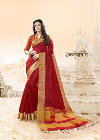 Adorn The Beautiful Queen Look In This Royal Looking SareeIn Maroon Color Paired With Orange Colored Blouse. This Saree And Blouse Are Fabricated On Handloom Cotton Silk Which Also Ensures Superb Comfort All Day Long.