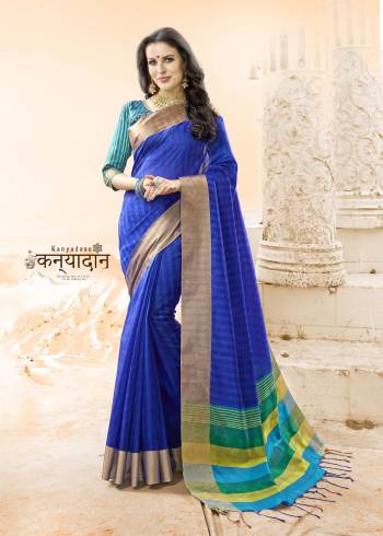 Shine Bright In This Royal Blue Colored Saree Paired With Turquoise Blue Colored Blouse. This Saree And Blouse Are Fabricated On Handloom Cotton Silk, Which Ensures Superb Comfort All Day Long. Buy Now.