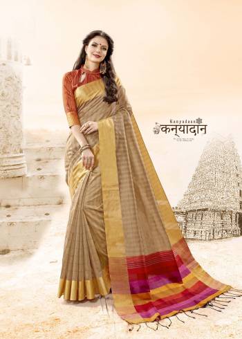 Simple And Elegant Looking Saree Is Here In Beige Color Paired With Orange Colored Blouse. This Saree And Blouse Are Fabricated On Handloom Cotton Silk. This Color And Fabric Will Give A Rich And Elegant Look To Your Personality. Buy Now.