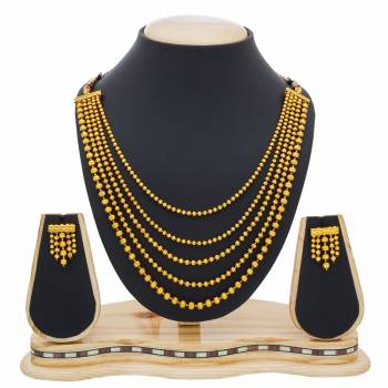 Layers Add Beauty To Any Attire. Grab This Elegant Necklace Set In Golden Color With Multiple Layers. It Is Light Weight And Easy To Carry All Day Long.