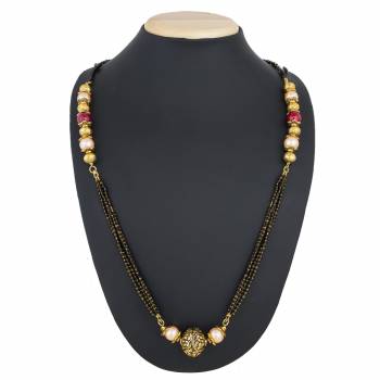 Here Is A Lovely Designer Mangalsutra With Multiple Layred Chains Of Black Moti. This Is For Some Occasion Wear And It Will Definitely Earn You Lots Of Compliments From Onlookers.