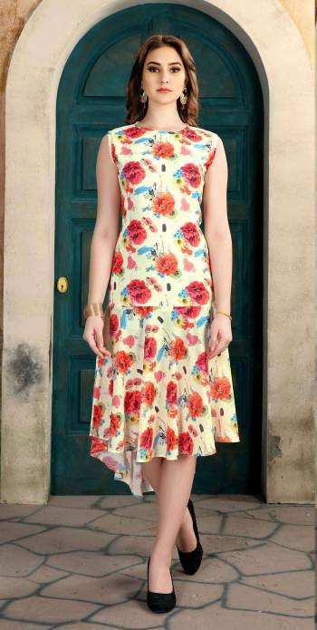 Go Floral With This Pretty Kurti In Off-White Color Beautified With Multi Colored Floral Prints All Over It. Buy This Readymade Kurti Now.