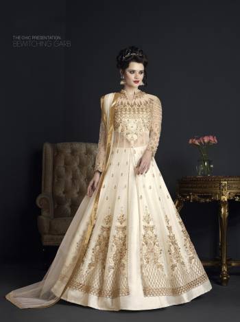 Simple And Elegant Looking Color That Everyone Wish To wear And Look Classy. Grab This Designer Suit In Off-White Color Paired With Off-White Colored Bottom And Dupatta. Its Top Is Fabricated On Net Paired With Art Silk Bottom And Net Dupatta. Buy This Heavy Designer Suit Now.