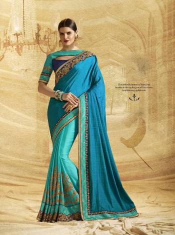 Go With The Shades Of Blue Wearing This Saree In Dark And Light Blue Color Paired With Dark Blue Colored Blouse. This Saree Is Fabricated On Silk Chiffon Paired With Art Silk Fabricated Blouse. It Is Beautified With Embroidery All Over Making The Saree More Attractive.